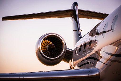 Corporate Jet at sunset wrapped bushes