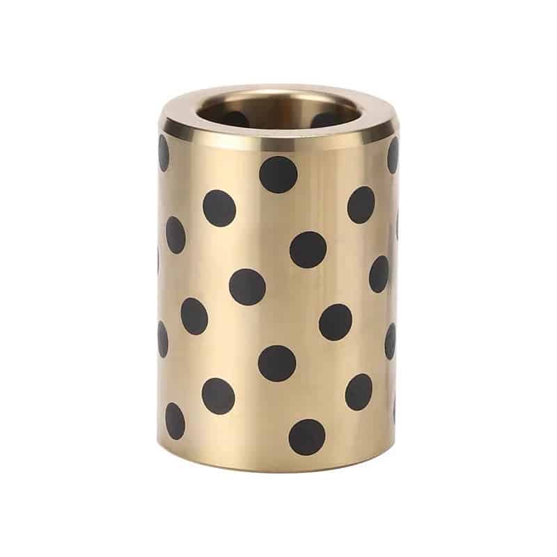 Cast bronze bushings with solid lubricant inserts